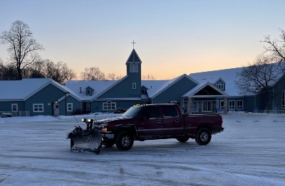 Snow removal truck in church parking lot